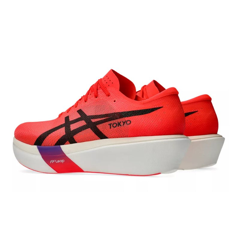 Red running shoes with black accents on a white background