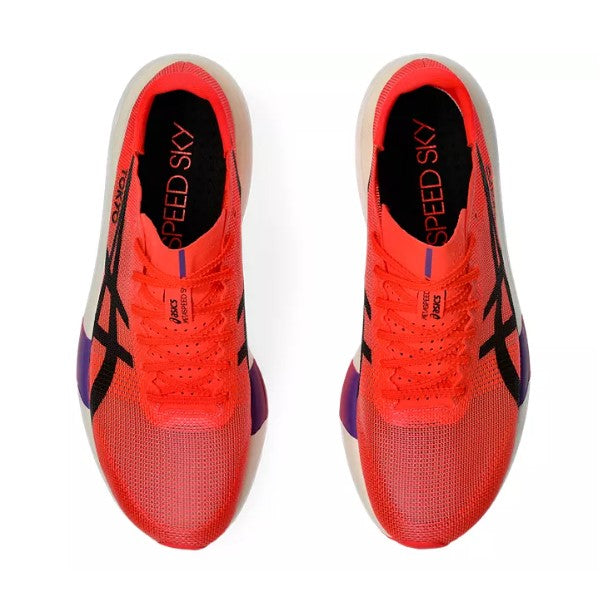 Red running shoes with black and purple accents on a white background