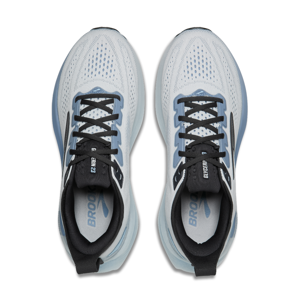 White running shoes with black and blue accents on a transparent background